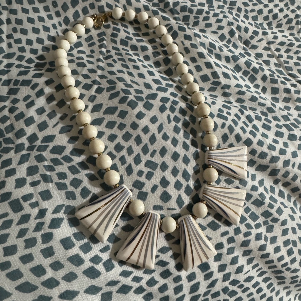 Elegant Cream Statement Necklace with gold and gray accents